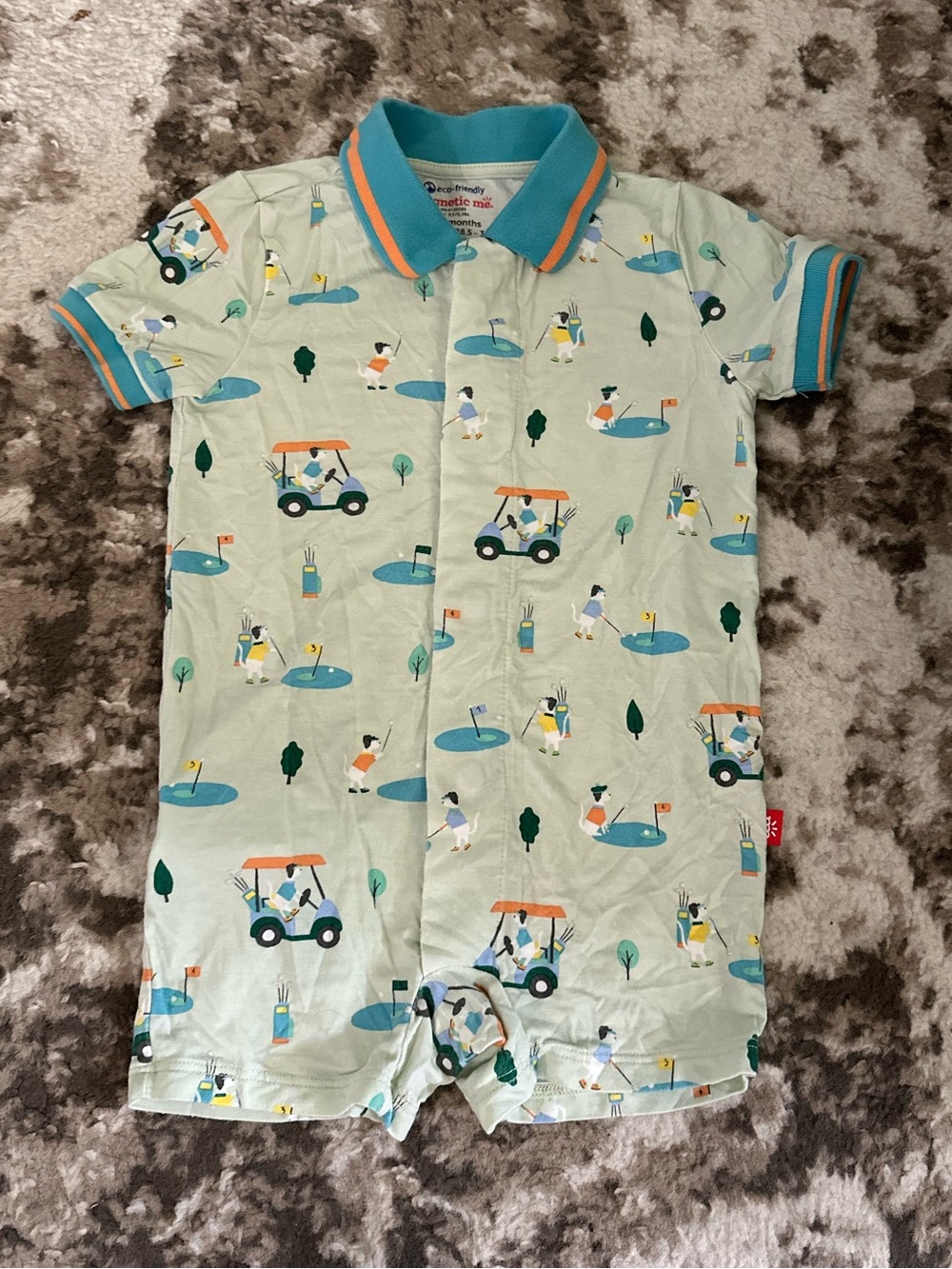 Magnetic Me Light Mint Polo Romper with Teal and Orange Trim